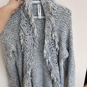 Big knit cardigan with frills